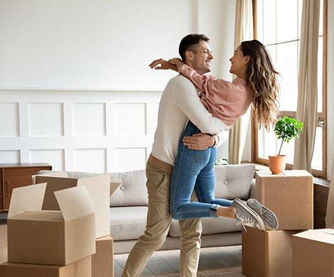 Young couple moving into new house